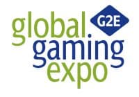Logo for the Global Gaming Expo, showcasing global gaming expo in vibrant green and blue lowercase letters, with G2E nestled in a blue diamond shape. Ideal for casino kiosks, this design captures the dynamic spirit of gaming innovation.