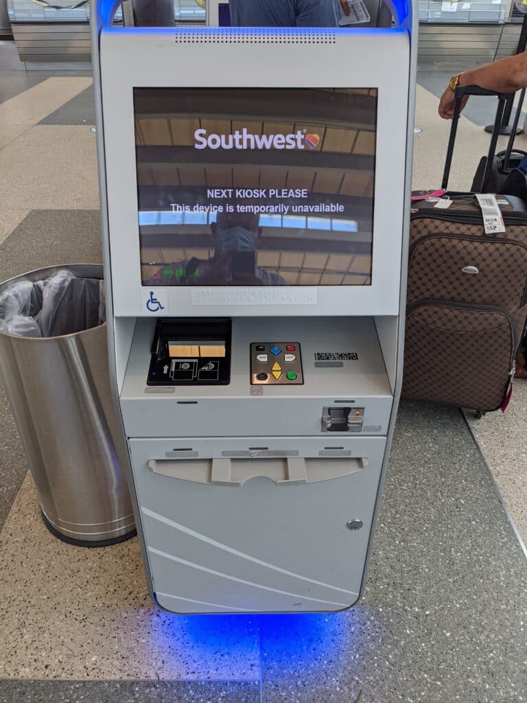 Damaged Braille Airport check-in kiosk SWA