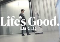 A person in a suit strolls alongside a flippy robot in a sleek, minimalist hallway. The text Lifes Good. LG CLOi is prominently displayed over the image, highlighting the seamless blend of technology and sophistication.