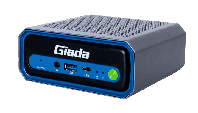 A compact, rectangular Giada mini PC designed for AI computers, featuring a gray vented top, blue and black front panel with a green power button, USB ports, and sleek branding.